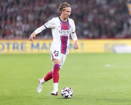 Footballer Mika Godts controls the ball while playing for PSG