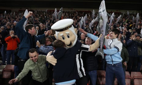Grimsby fans celebrate during their win over Southampton in the FA Cup.