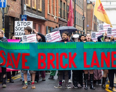 Protesters in Brick Lane bearing 'Save Brick Lane' banner.