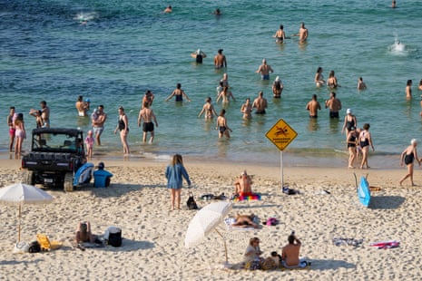 People swim at Sydney’s Bondi beach