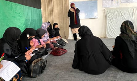 Girls being taught in an underground school in Herat, Afghanistan, 2024.