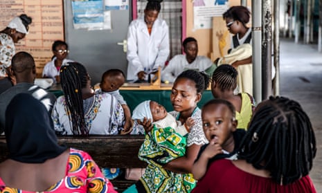 Mothers wait with their babies for medical checkups in the maternal child ward at Kilifi County Hospital in Kilifi, Kenya.