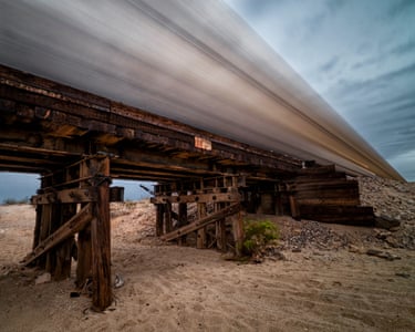 Arizona, US ‘A freight train passing over a small trestle bridge. Shot near Kingman.’