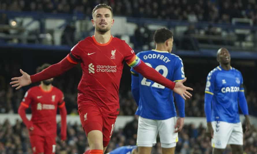 Liverpool’s Jordan Henderson celebrates after opening the scoring against Everton
