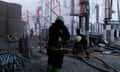Firefighters extinguish a blaze at an electricity facility after a Russian attack in Kharkiv, Ukraine, on 22 March, 2024