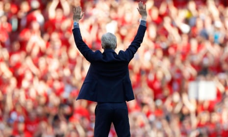 Arsène Wenger waves goodbye to the Emirates crowd from the centre circle after the final whistle.