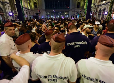Police form a line at the Keleti (Eastern) railway station in Budapest.