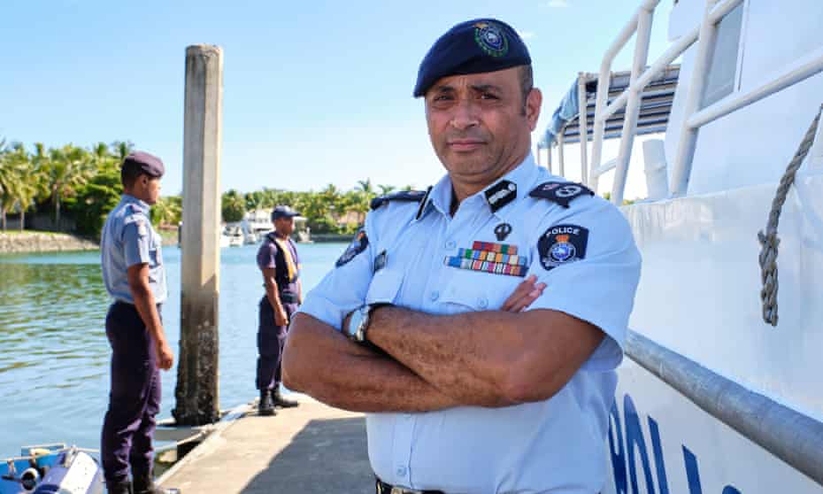 Fiji police commissioner Brigadier General Sitiveni Qiliho next to the police patrol boat Veiqaravi