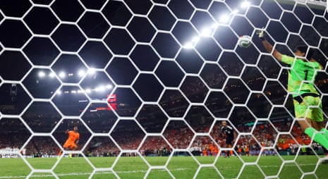 Netherlands' Crysencio Summerville has his penalty saved by Morocco's Yassine Bounou during a penalty shoot-out.