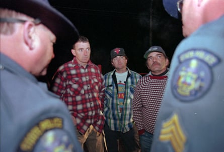 three men side by side