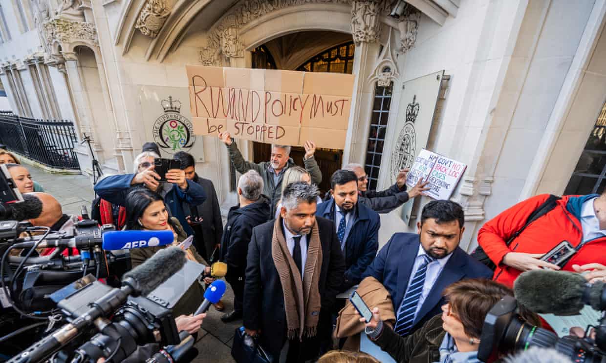 Toufique Hossain, an immigration lawyer, and Care4Calais representatives exit the supreme court last month after it concluded the government’s Rwanda policy is unlawful. Photograph: Guy Bell/Shutterstock