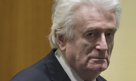 Radovan Karadžić enters the courtroom in The Hague
