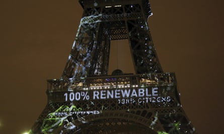 An artwork entitled One Heart One Tree by Naziha Mestaoui is displayed on the Eiffel tower before the 2015 climate conference in Paris.