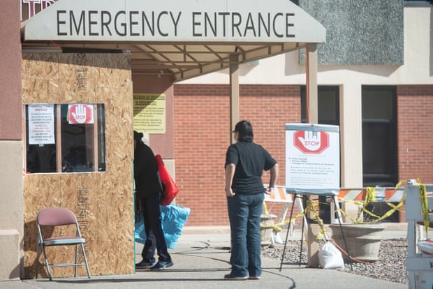 Visitors check in at the emergency entrance before entering Rehoboth McKinley Christian hospital.