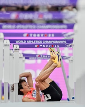 Japan’s Shunsuke Izumiya falls in a men’s 110m hurdles semi-final.