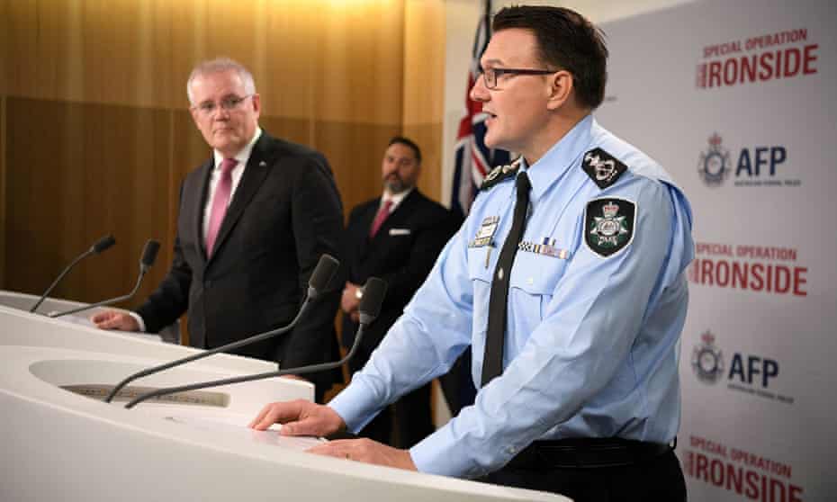 The Australian Federal Police commissioner, Reece Kershaw, announces the arrests with the prime minister, Scott Morrison. The AFP partnered with the FBI to monitor the ANoM app on devices.