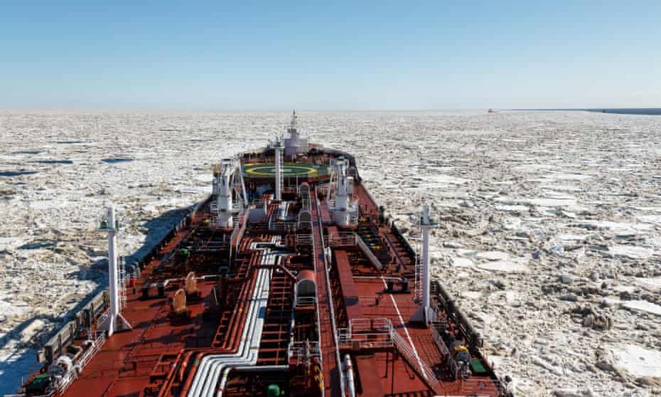 A huge tanker passing through melting ice