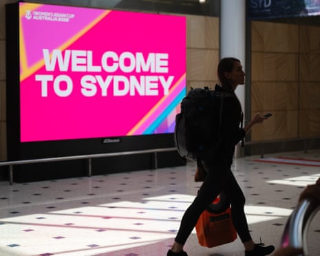 Passengers on a flight from Dubai arrive at Sydney international airport in Sydney on6 March.