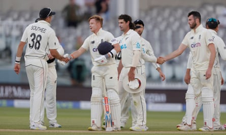 England and New Zealand players shake hands on the draw on day five of the first Test at Lord’s on 6 June 2021.