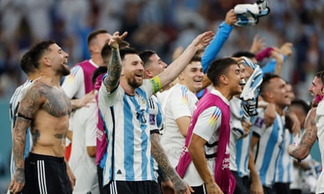Lionel Messi leads the Argentina celebrations at full time.