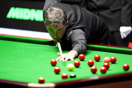 Ronnie O'Sullivan plays a shot