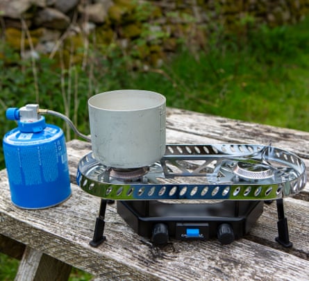 best mini backpacking stove Camping Stove, Stove, Foldable, Portable, Lightweight, Piezo Ignition, Single Burner Adjustable, Premium Powerful and Stable Camp you can cook with large pots on uneven terrain.There is also a small pot for cooking and consuming your meals and drinks AOTU Portable Camping Stoves Backpacking