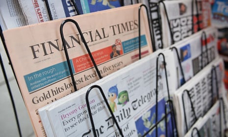 newspapers on a stand