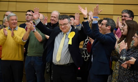 Stephen Farry of the Alliance Party celebrates with supporters after he won the North Down constituency, Bangor, Northern Ireland