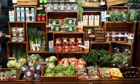 Crates of vegetables in store