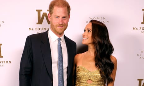 The Duke and Duchess of Sussex pose at an awards ceremony before the ‘near catastrophic’ car chase