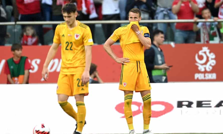 Chris Gunter of Wales (right) looks saddened after conceding a goal during the UEFA Nations League match against Poland at Wroclaw Stadium.