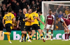 Wolverhampton Wanderers’ Raul Jimenez (right) celebrates with Ruben Neves after scoring their side’s first goal of the game.