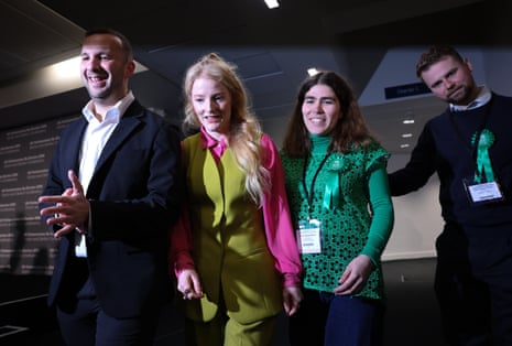 Green party Leader Zack Polanski (L) and candidate Hannah Spencer (second L) arriving for the declaration after the vote count in Manchester