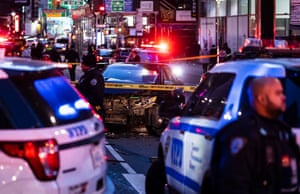 New York, US: police officers attend the scene of a suspected carjacking on Broadway, north of Times Square
