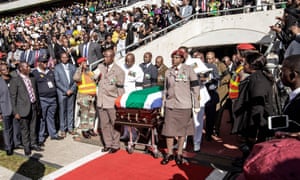 South African military personnel bring in the coffin at Orlando Stadium in Soweto for the funeral ceremony of Winnie Madikizela-Mandela