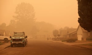 An orange smoke-filled sky is seen above Molalla, Oregon on Thursday as fires burn nearby.