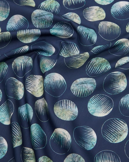 A piece of blue fabric with circular patterns of varying bluey green hues ©Liberty Obscured Landscape, Creativity in Conflict & Confinement by Liberty in creative partnership with IWM (1)