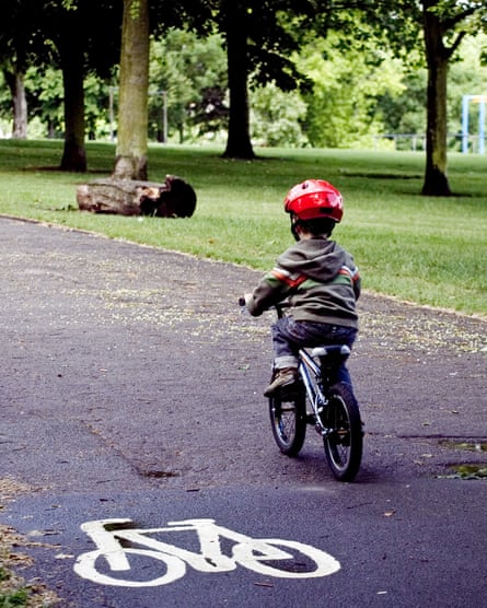 A small child riding a bike in a park. Islabikes, which transformed children’s bikes to make them lighter and easier to handle, recently said it would cease manufacturing.