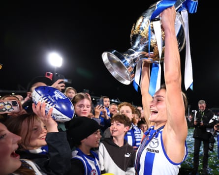 Ash Riddell celebrates winning the AFLW grand final between North Melbourne and Brisbane at Ikon Park