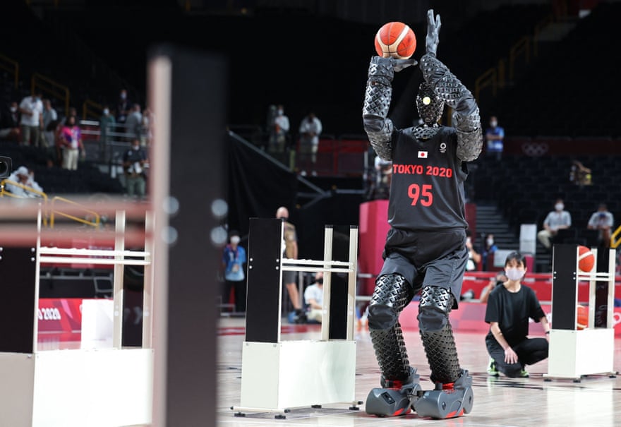 Toyota has created a 6ft10in basketball-shooting robot named CUE that uses sensors on its torso to judge the distance and angle of the basket.