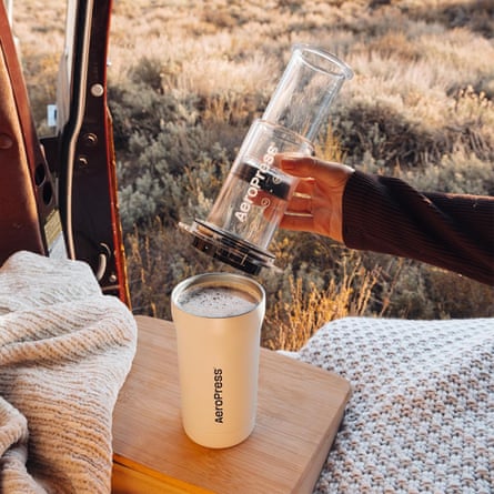 A person making coffee with an Aeropress Go Plus