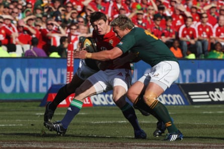 Brian O’Driscoll being tackled by two Springboks when playing for the Lions in 2009
