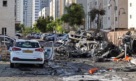 Burnt out vehicles in Ashkelon are pictured following a rocket attack from the Gaza Strip into Israel