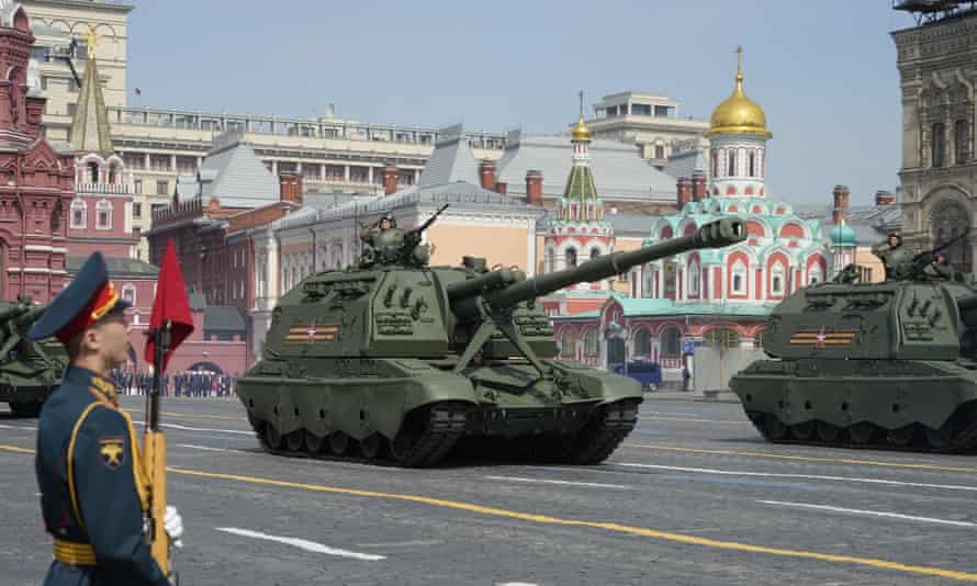 Self-propelled artillery vehicles roll past during a dress rehearsal for the Victory Day military parade in Moscow, Russia, on Saturday.