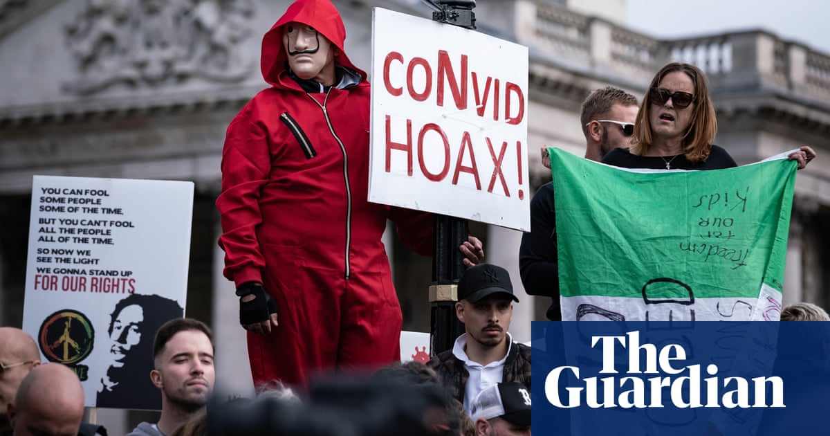 Quarter in UK believe Covid was a hoax, poll on conspiracy theories finds