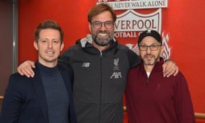 Jürgen Klopp (centre) with the sporting director, Michael Edwards (left), and the FSG president, Mike Gordon, after the Liverpool manager signed a contract extension in December 2019.