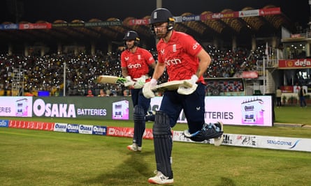 Alex Hales (left) and Phil Salt enter the pitch for England's series-deciding T20 match against Pakistan