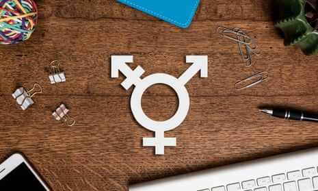 Transgender symbol on a wooden desk