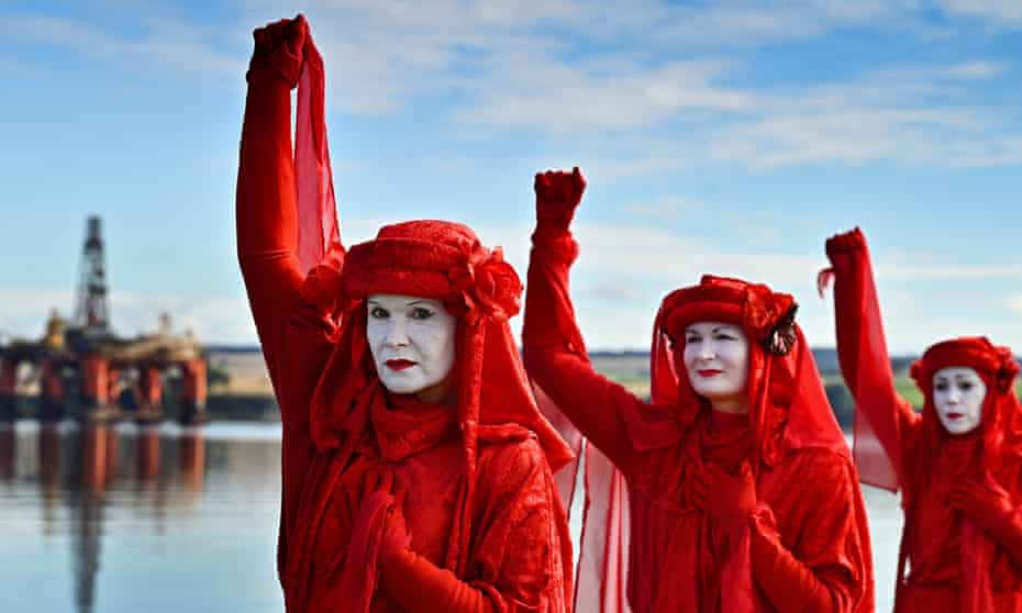 Extinction Rebellion protesters take part in a blockade of an oil rig maintenance facility in Scotland