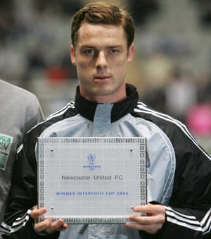 Scott Parker holds with an award commemorating his side's overall Intertoto Cup victory